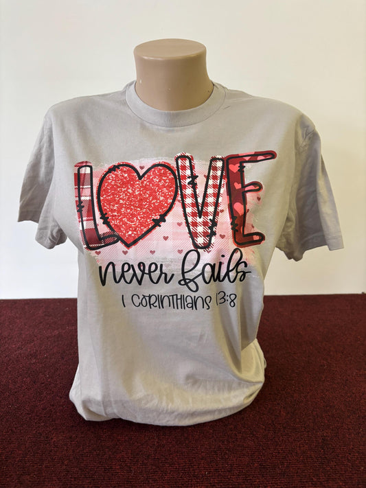 Love Never Fails T shirt